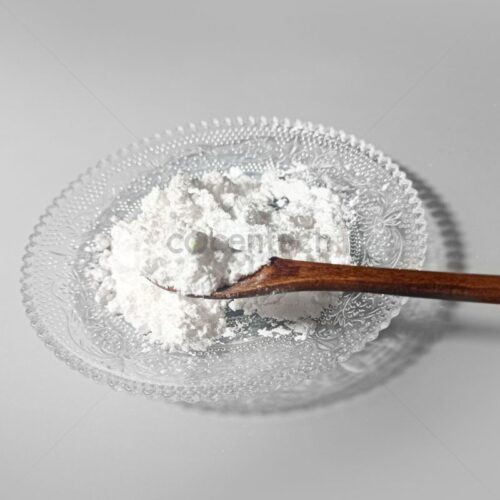 2'-AMINOBENZANILIDE powder with a wooden spoon