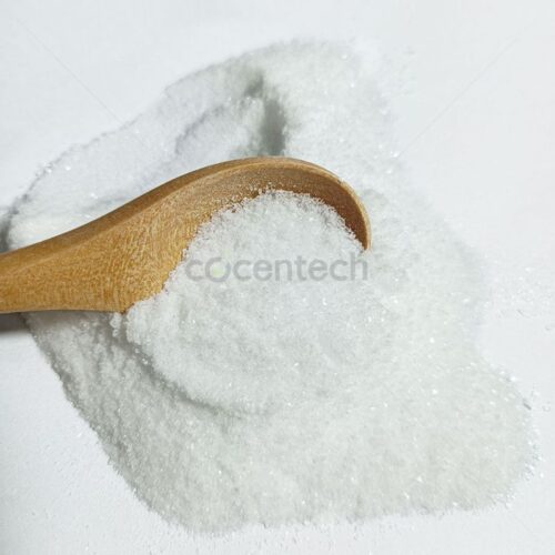 White crystalline powder Diphenylacetonitrile is poured onto a white background plate.